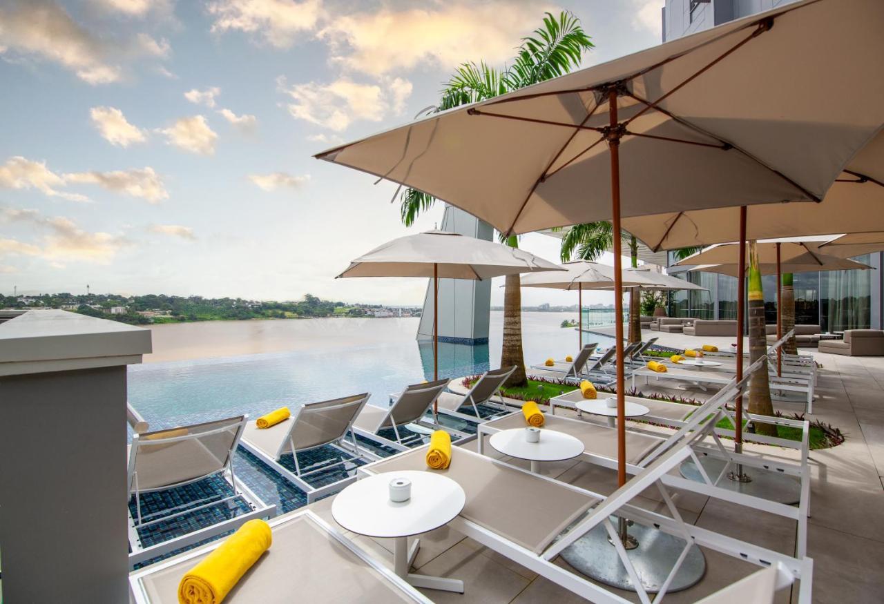 Noom Hotel Abidjan Plateau Εξωτερικό φωτογραφία The pool at the hotel